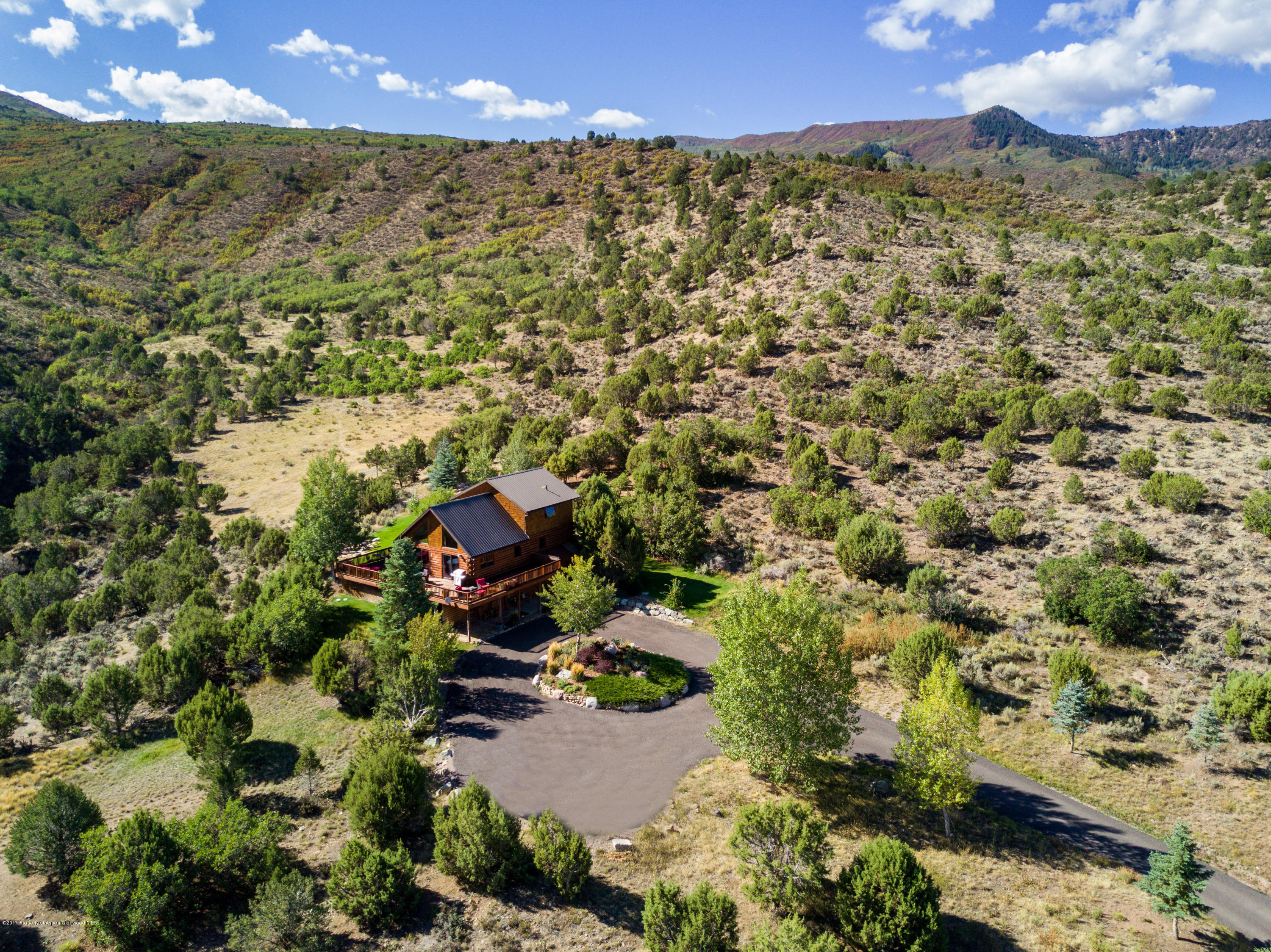 1436 Hooks Spur Road Basalt, CO 81621 - Photo 15 of 21 an aerial view of residential houses with outdoor space and trees