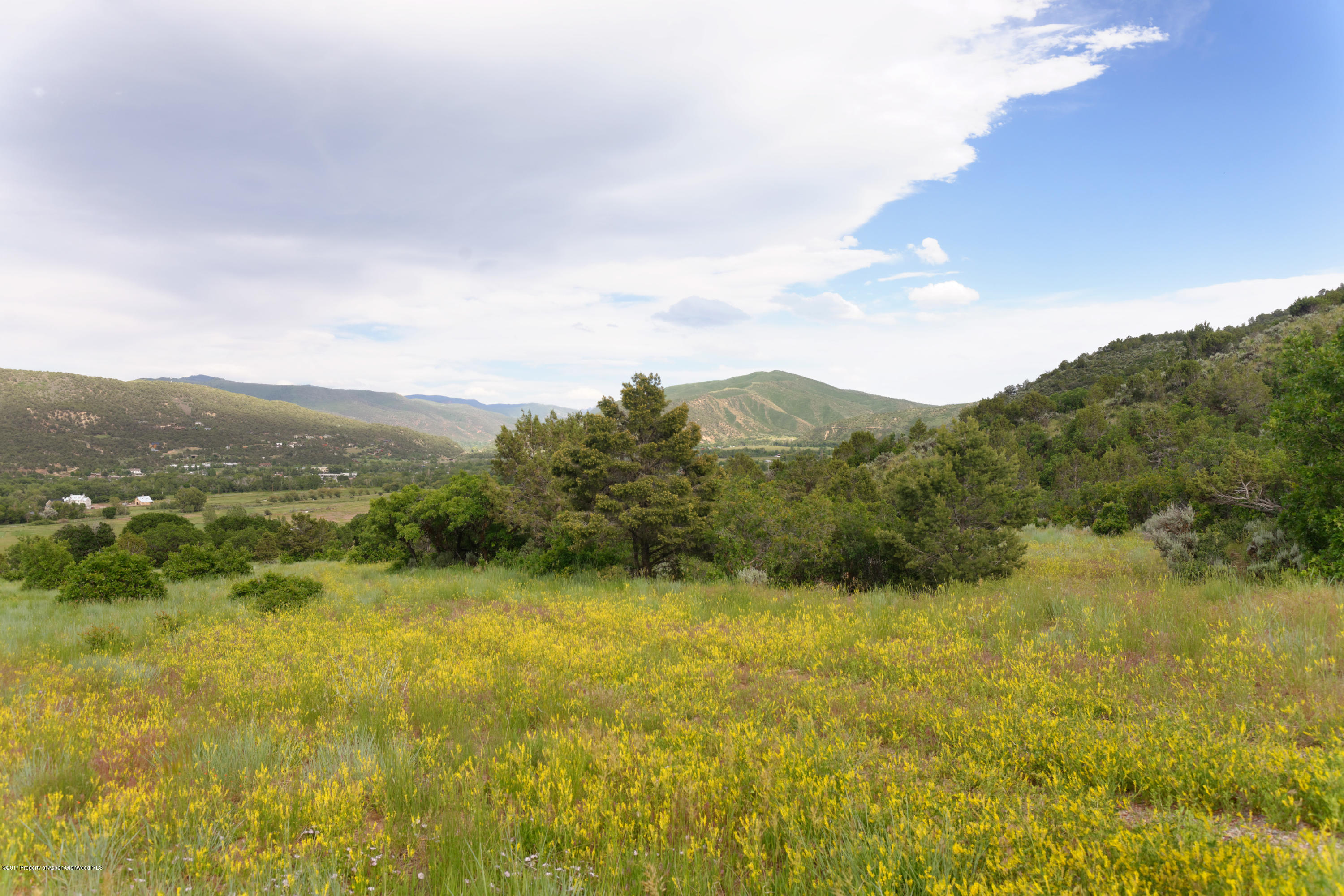 1436 Hooks Spur Road Basalt, CO 81621 - Photo 20 of 21 a view of a lake with mountains in the background
