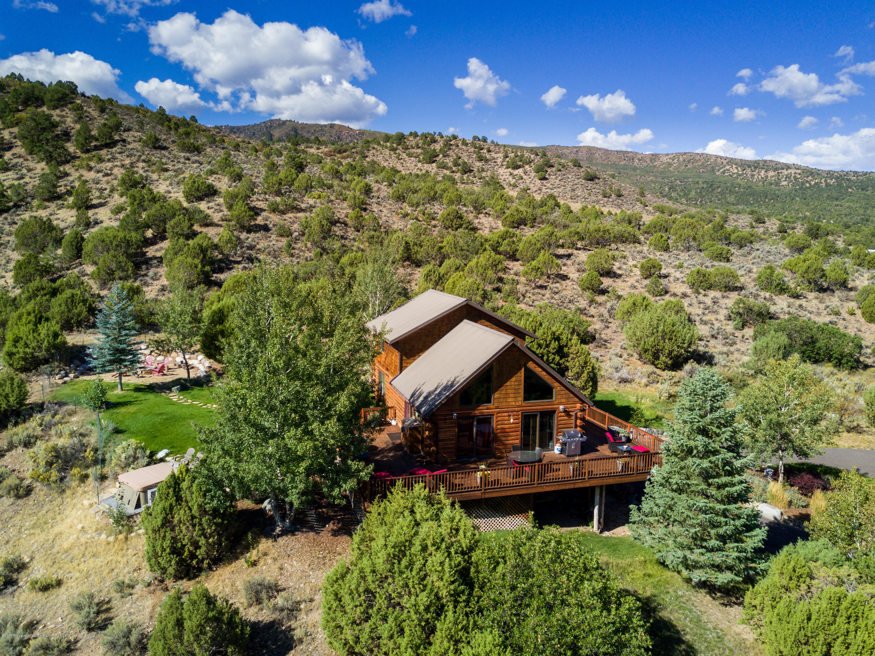 1436 Hooks Spur Road Basalt, CO 81621 - Photo 5 of 21 a view of a houses with a yard
