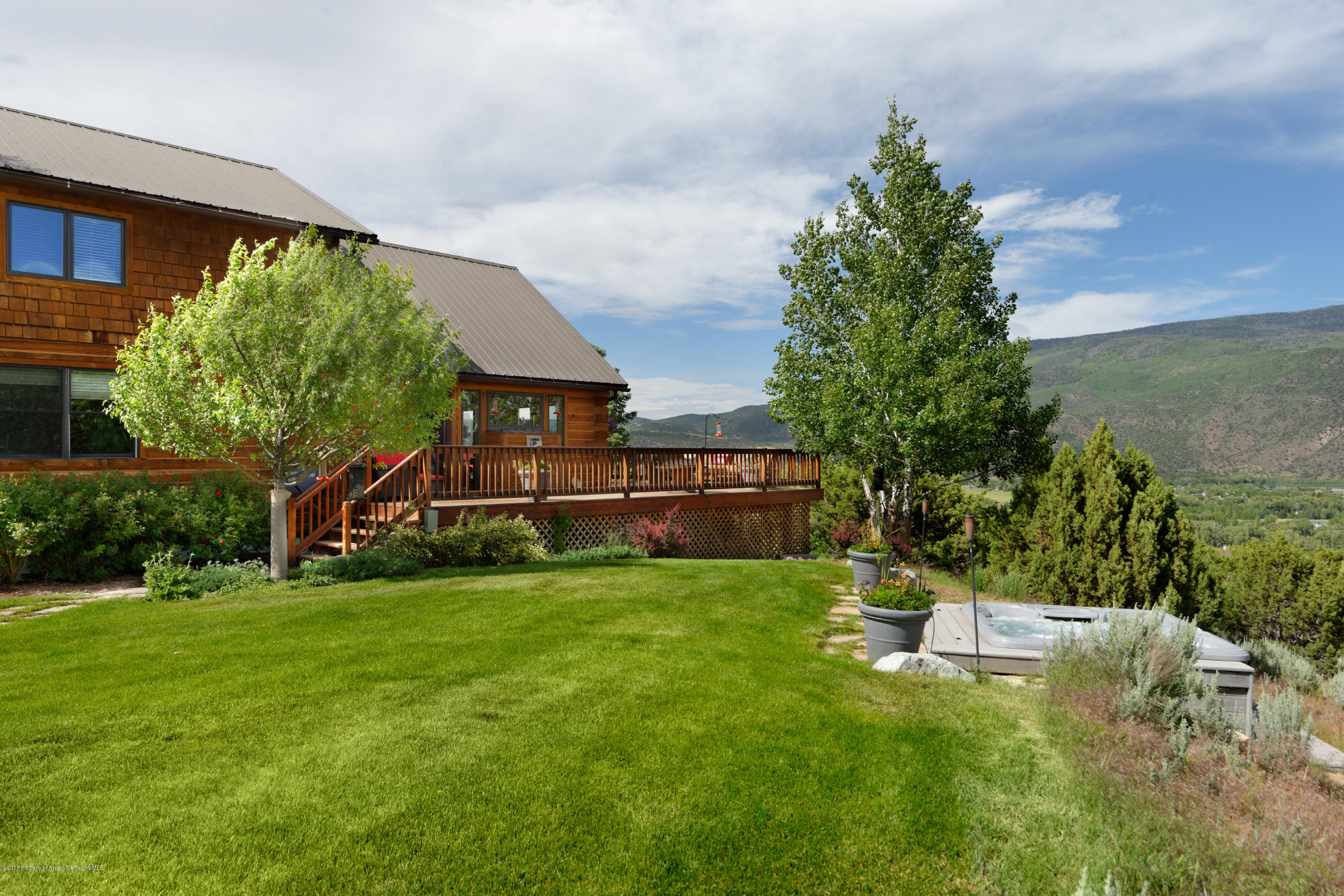 1436 Hooks Spur Road Basalt, CO 81621 - Photo 6 of 21 a view of a house with a yard