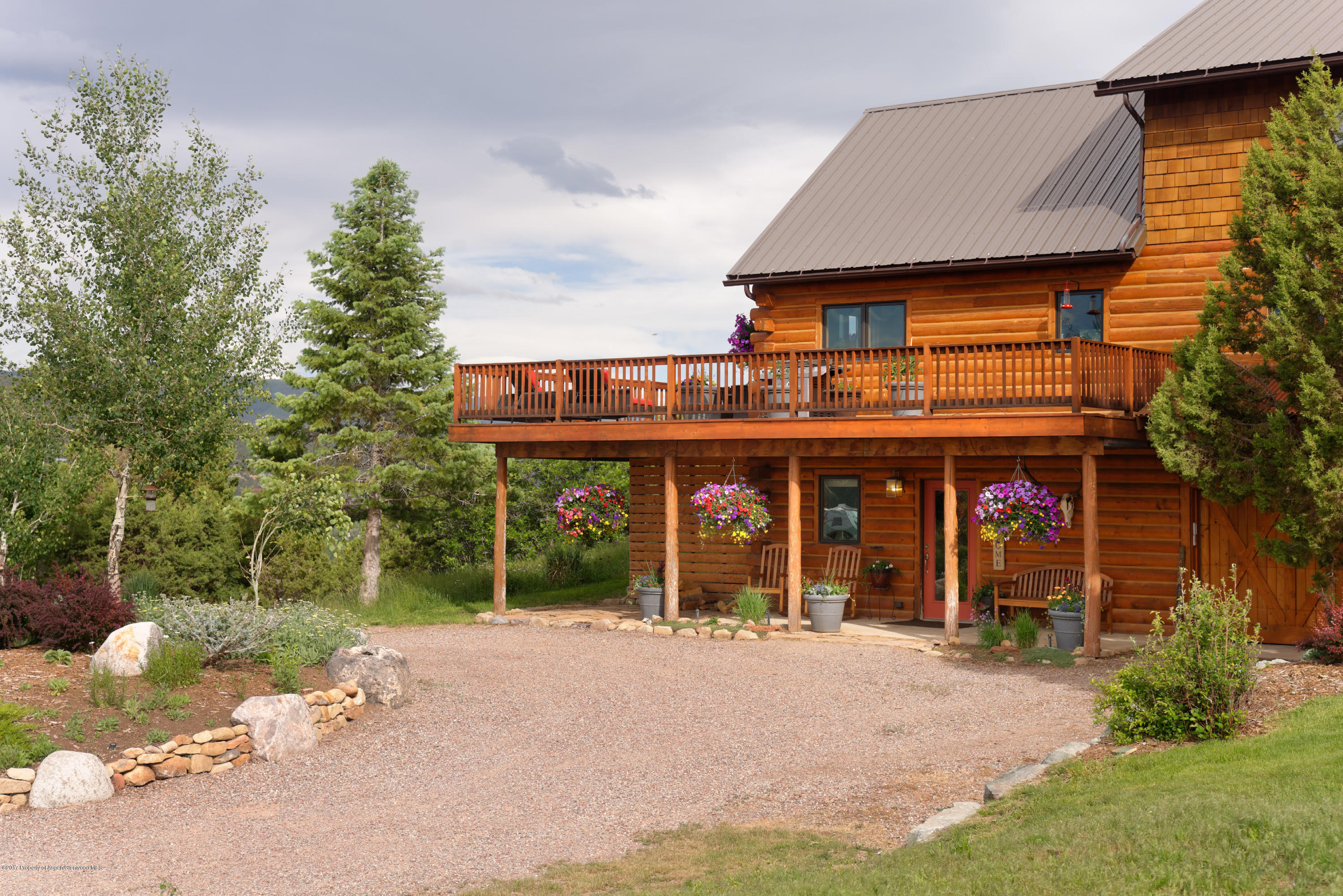 1436 Hooks Spur Road Basalt, CO 81621 - Photo 7 of 21 a view of a house with backyard porch and sitting area