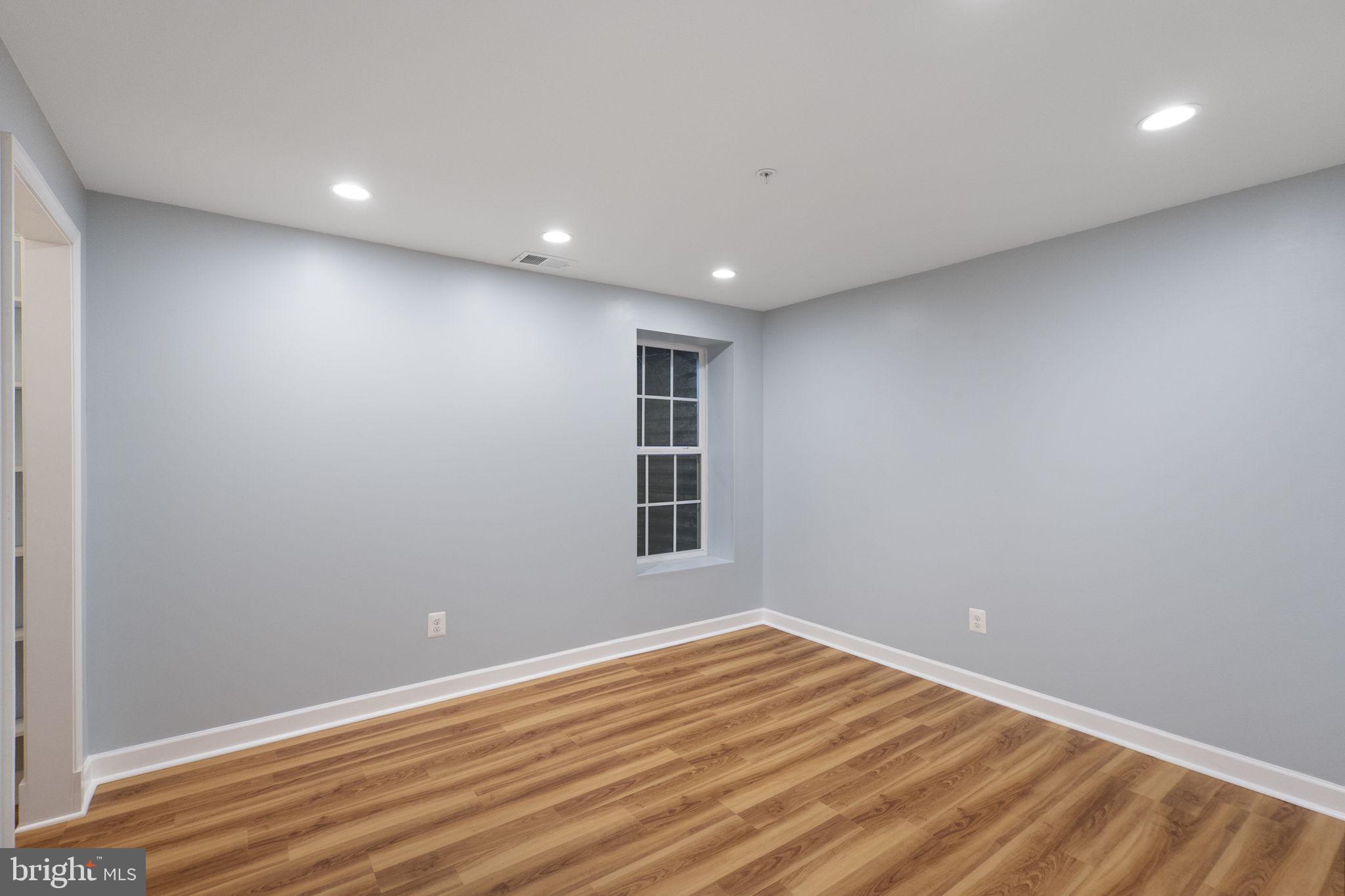 23902 Grapevine Ridge Terrace Clarksburg, MD 20871 - Photo 28 of 44 a view of empty room with wooden floor