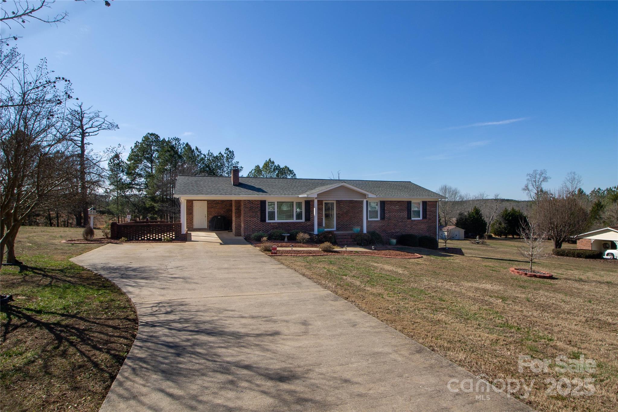 932 Long Branch Road Grover, NC 28073 - Photo 3 of 22 a front view of a house with a yard