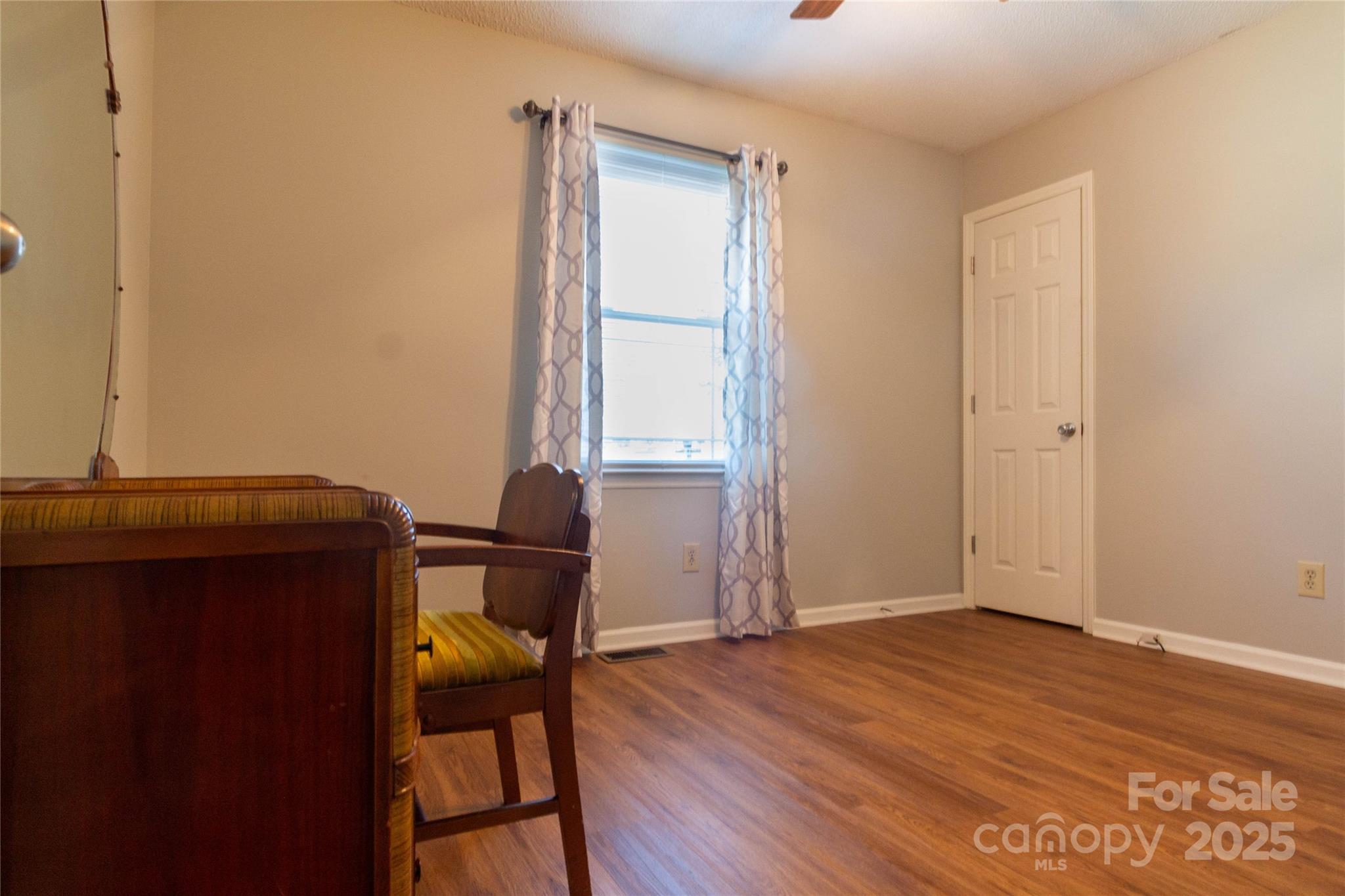 932 Long Branch Road Grover, NC 28073 - Photo 10 of 22 a view of a room with wooden floor and a window