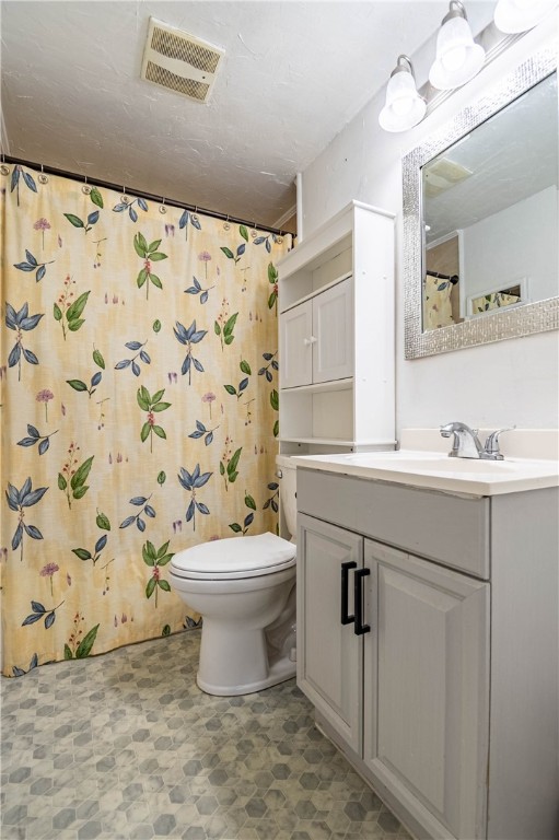 4016 Bayview Drive Decatur, IL 62521 - Photo 10 of 15 a bathroom with a sink toilet and shower