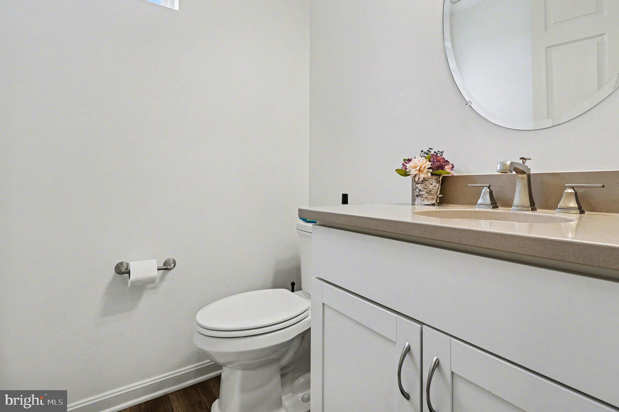 18474 Patriot Lane Ruther Glen, VA 22546 - Photo 22 of 25 a bathroom with a sink and a toilet