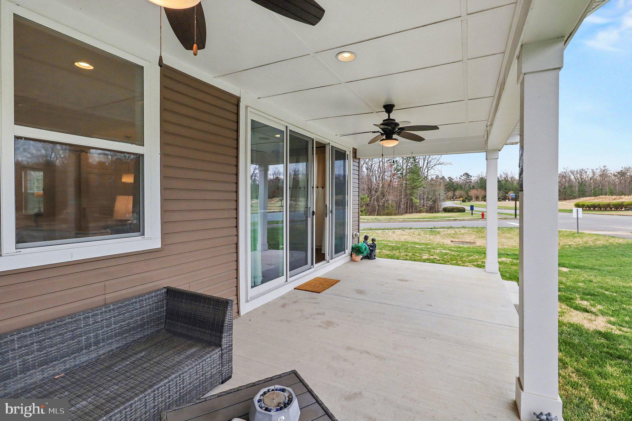 18474 Patriot Lane Ruther Glen, VA 22546 - Photo 23 of 25 a view of an entryway door and a yard