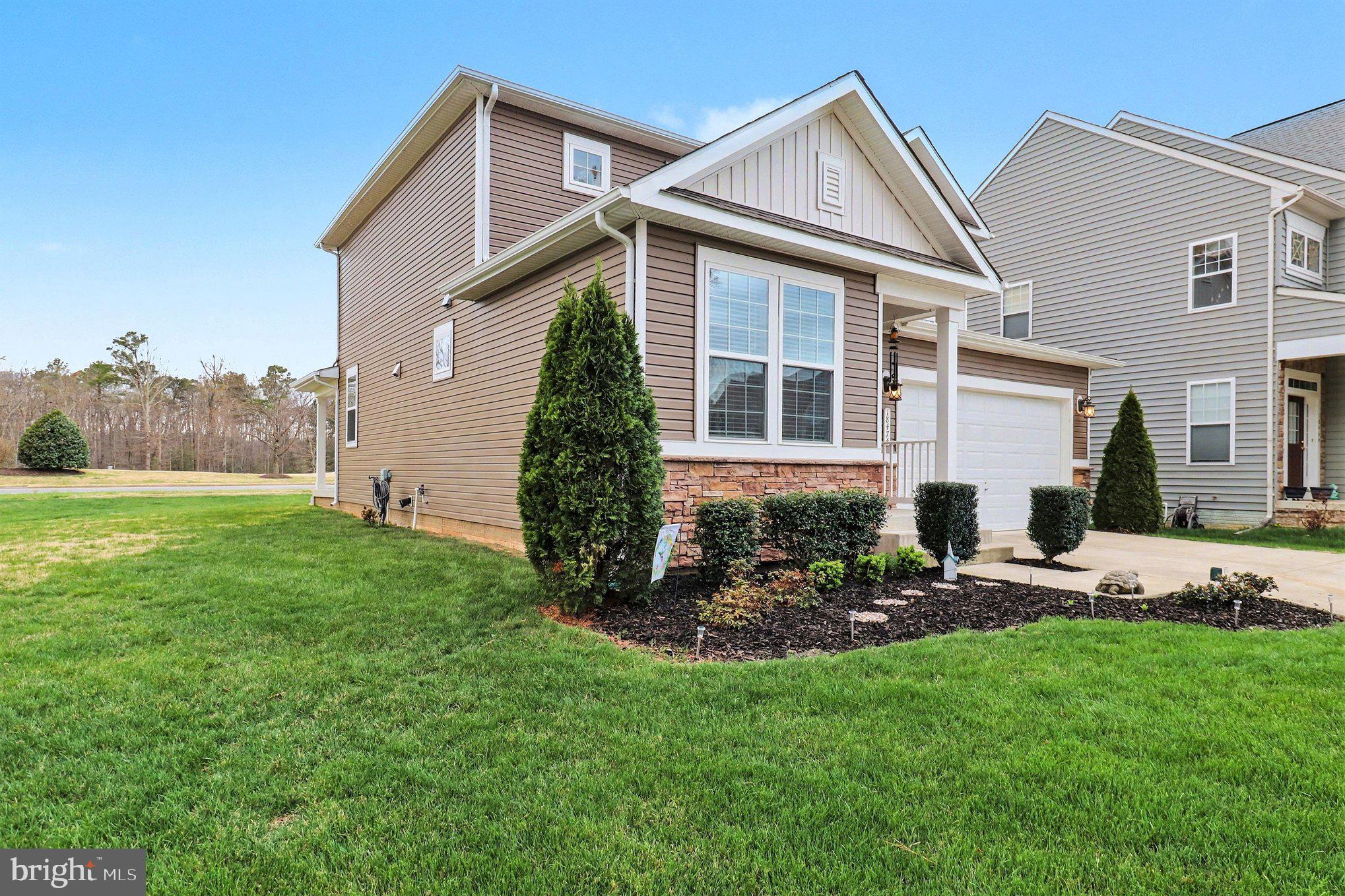 18474 Patriot Lane Ruther Glen, VA 22546 - Photo 3 of 25 a view of a house with backyard and sitting area