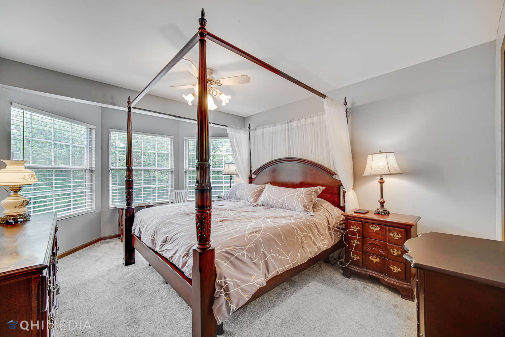 261 Ascot Lane Streamwood, IL 60107 - Photo 13 of 23 a bedroom with a bed and a night stand