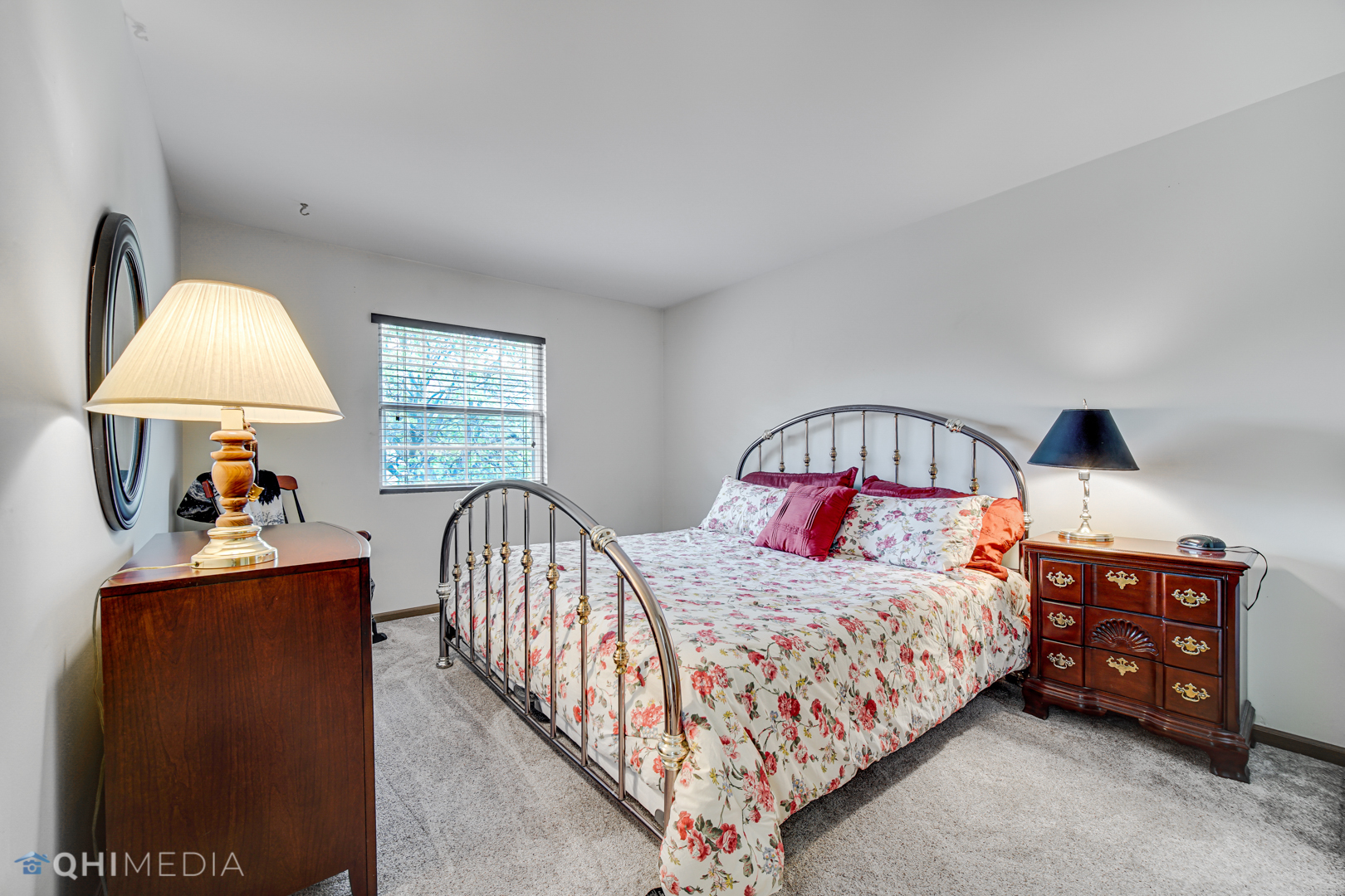 261 Ascot Lane Streamwood, IL 60107 - Photo 16 of 23 a bedroom with a bed and a window