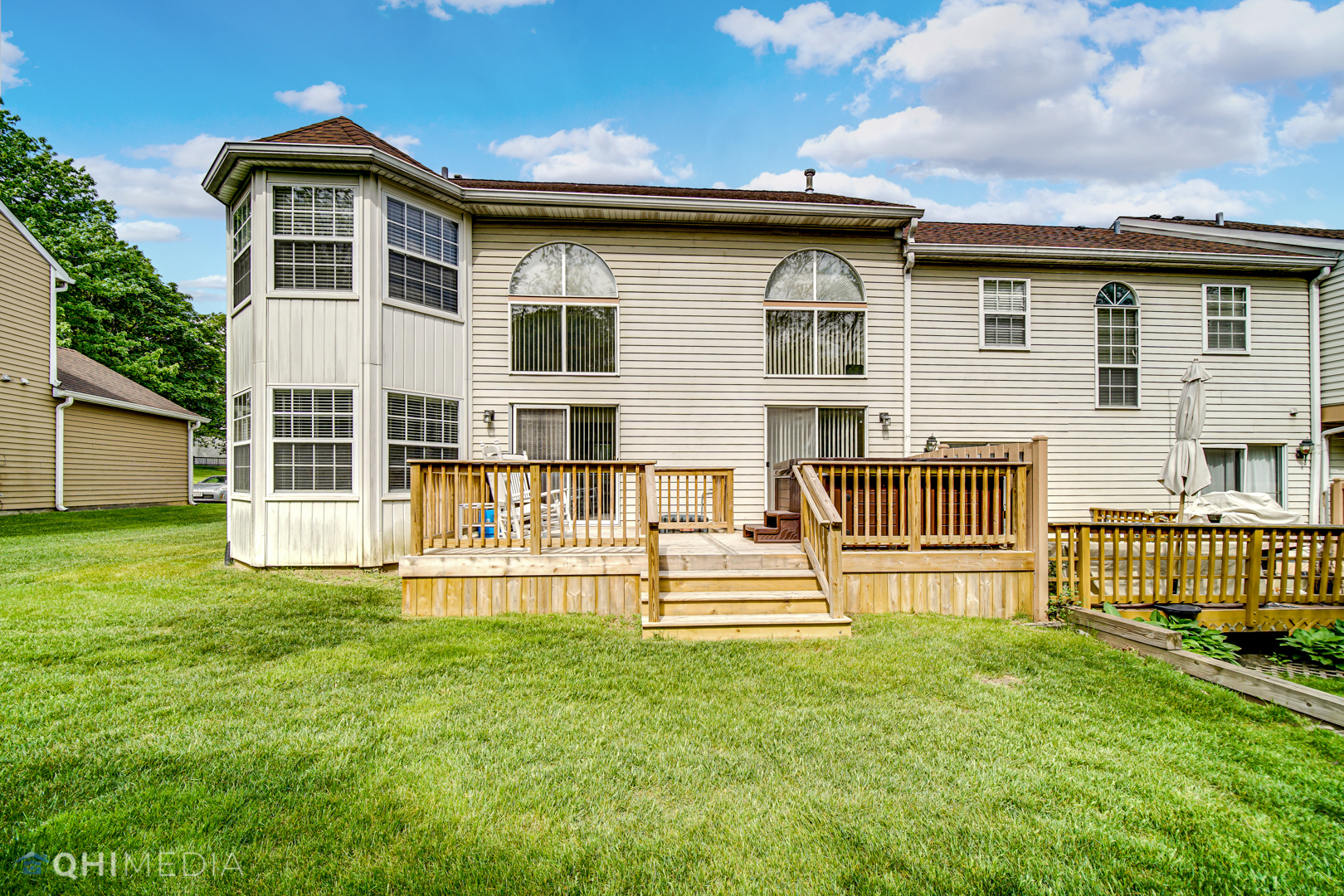 261 Ascot Lane Streamwood, IL 60107 - Photo 22 of 23 a front view of a house with a yard
