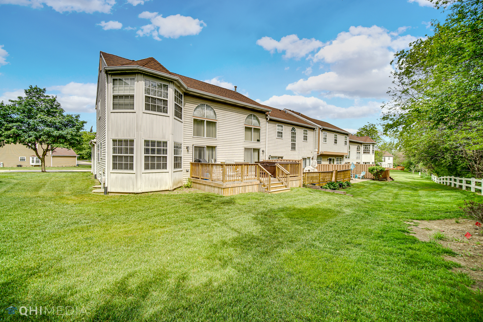 261 Ascot Lane Streamwood, IL 60107 - Photo 23 of 23 a front view of a house with a yard