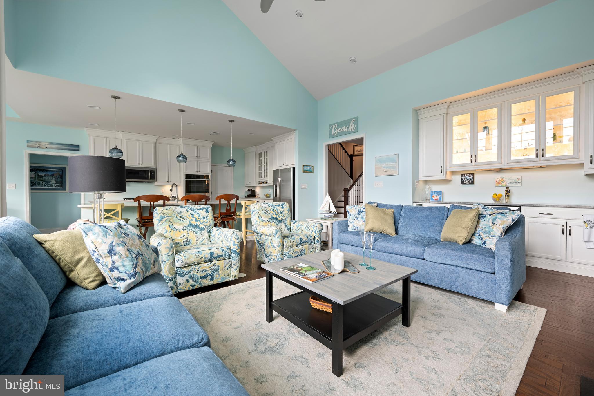 34017 Smiths Point Lane Lewes, DE 19958 - Photo 11 of 66 a living room with furniture kitchen view and a window