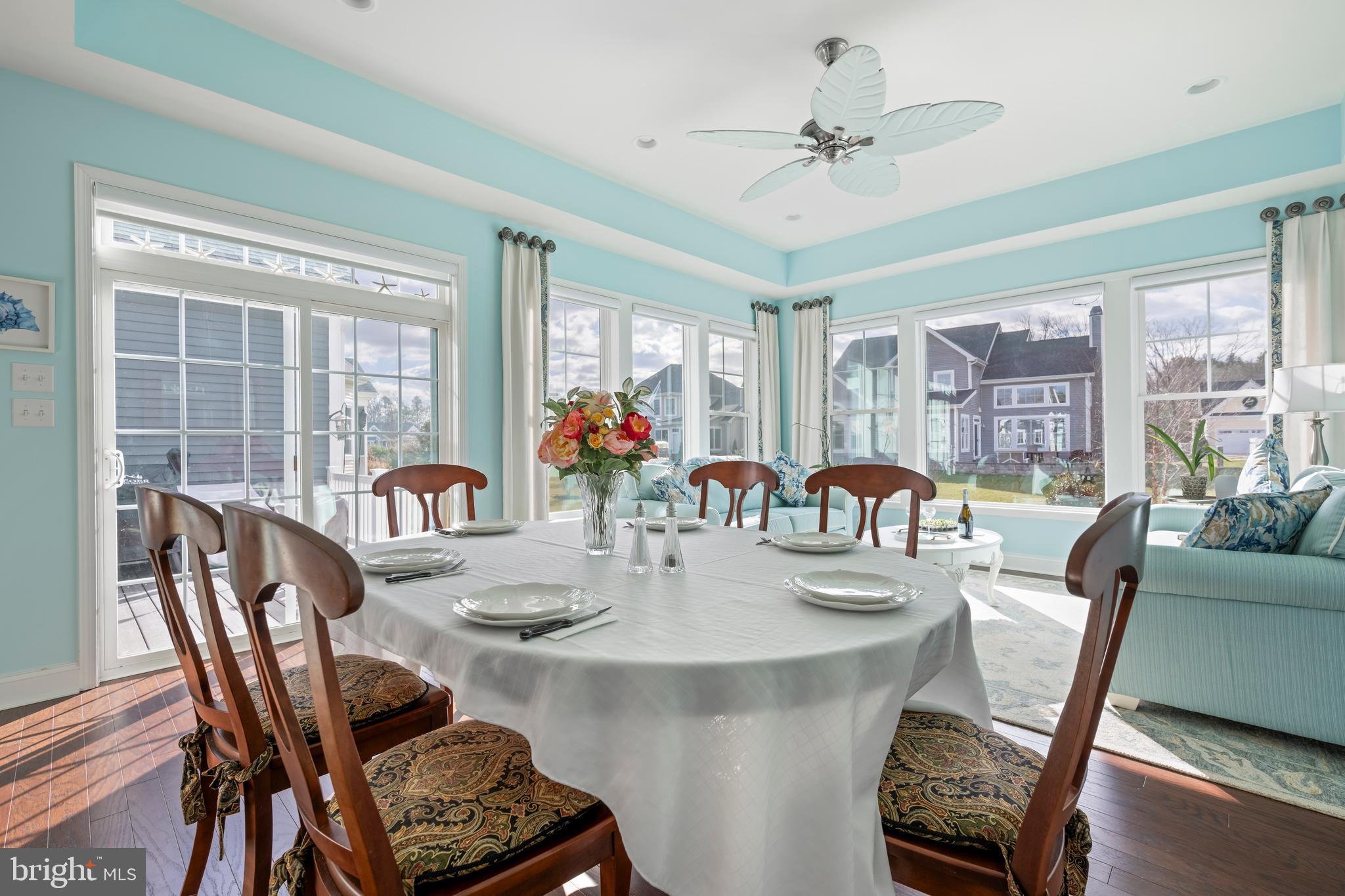 34017 Smiths Point Lane Lewes, DE 19958 - Photo 18 of 66 a view of a dining room with furniture window and outside view