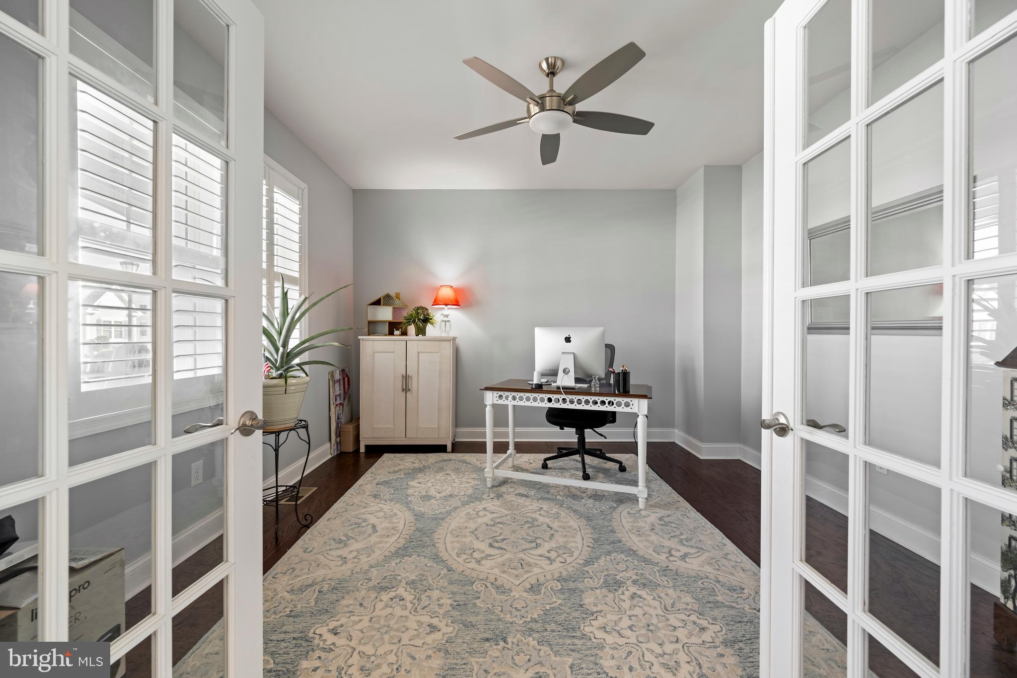 34017 Smiths Point Lane Lewes, DE 19958 - Photo 24 of 66 a view of a workspace with furniture and a window