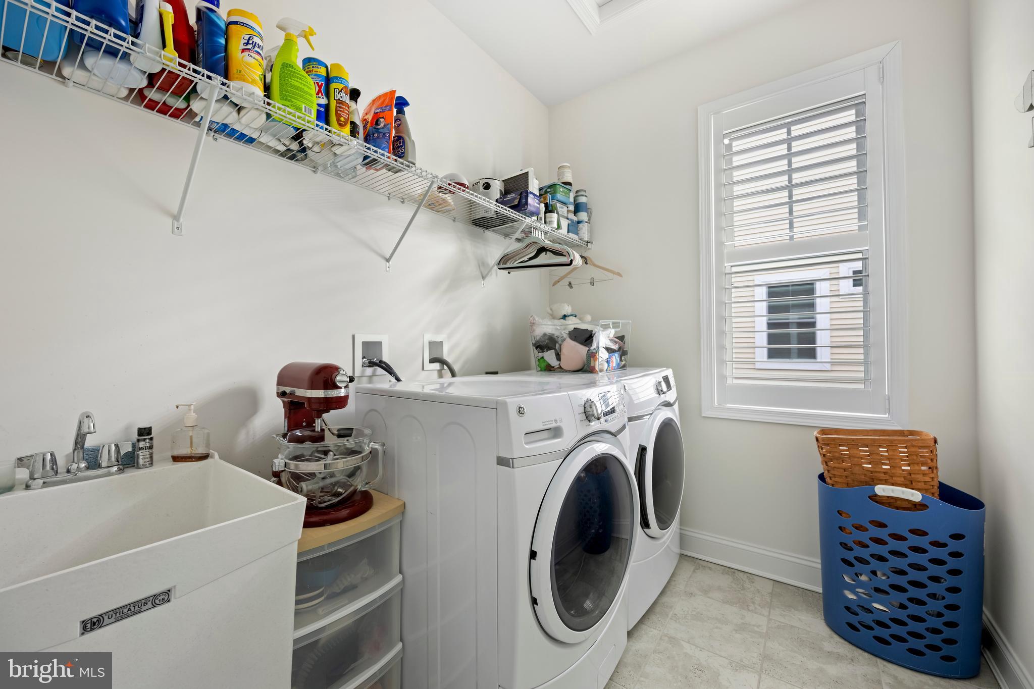 34017 Smiths Point Lane Lewes, DE 19958 - Photo 39 of 66 a utility room with dryer and washer