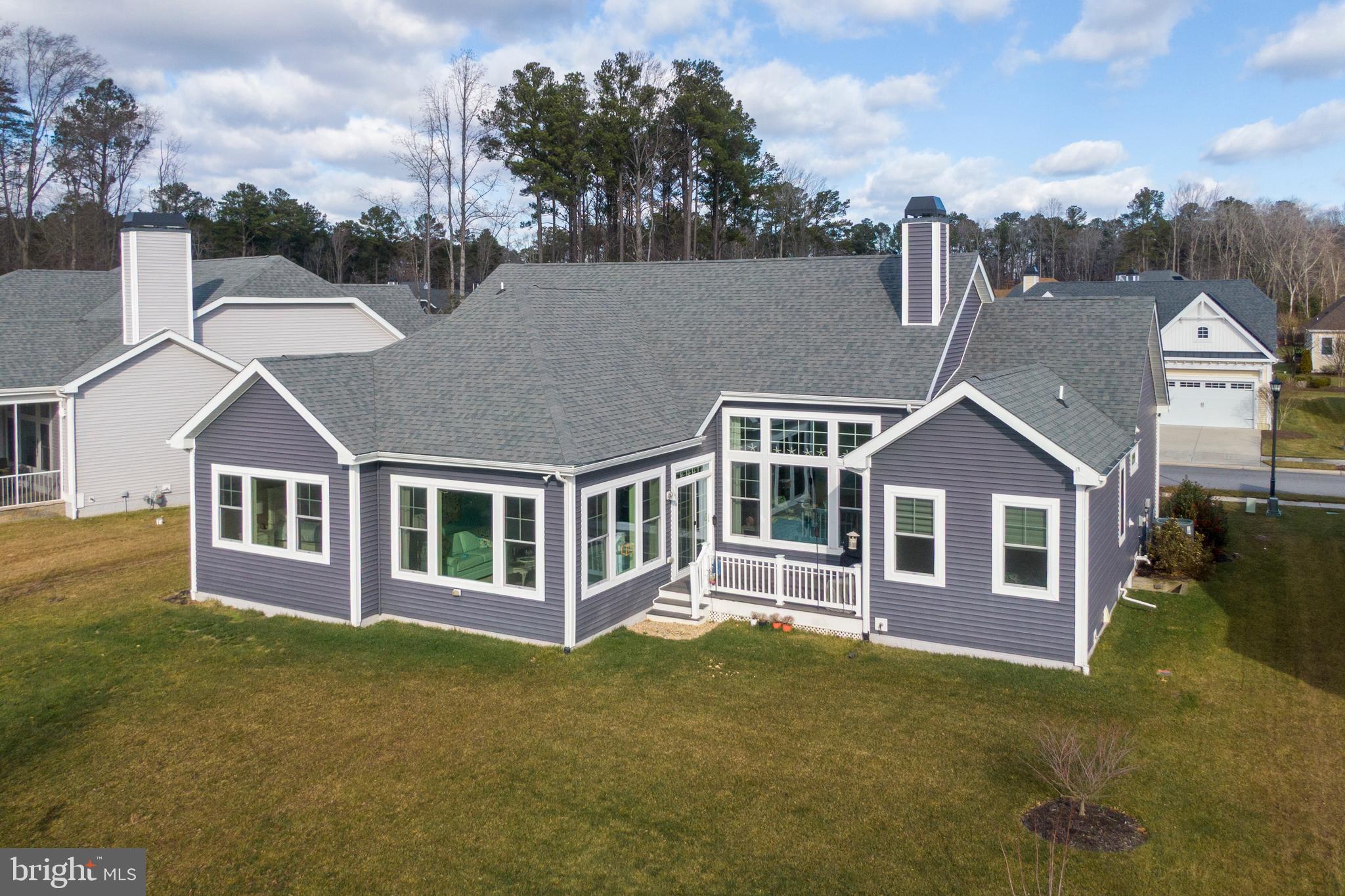 34017 Smiths Point Lane Lewes, DE 19958 - Photo 40 of 66 Rear Home with Sundeck
