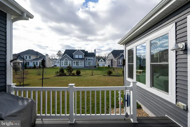 a view of a swimming pool and lounge chair