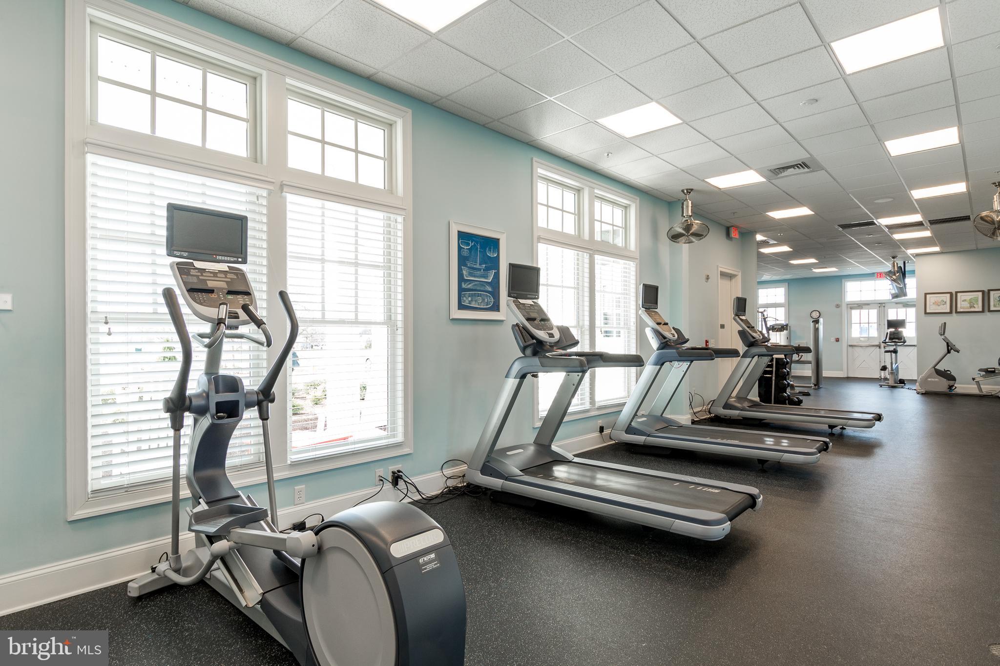 34017 Smiths Point Lane Lewes, DE 19958 - Photo 62 of 66 a room with gym equipment and a large window