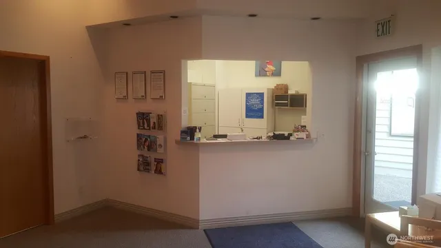 a view of workspace with wooden door