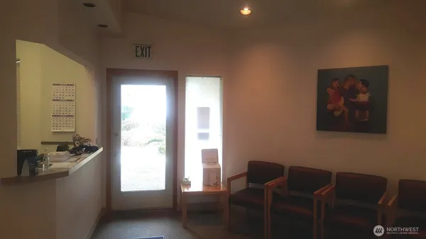 a view of a workspace with furniture