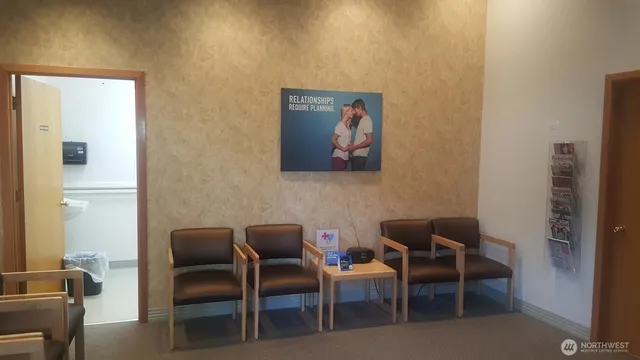 a view of room with window and chair