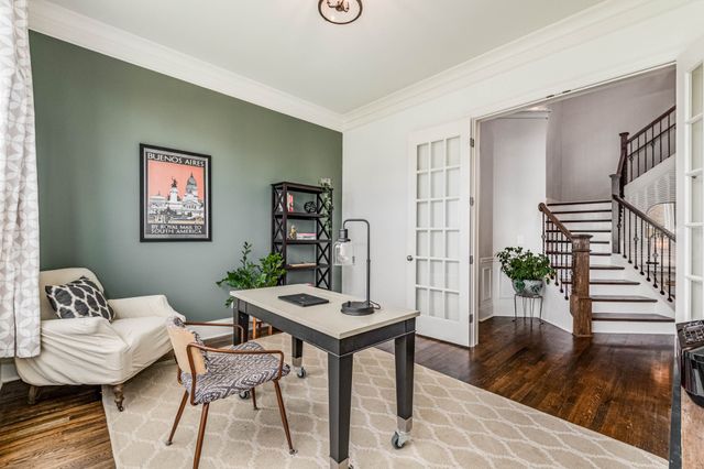 a view of storage and utility room with washer and dryer