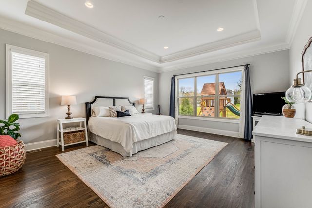 a bathroom with double vanity sink and a mirror