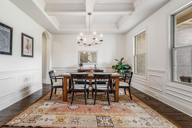 a living room with furniture fireplace and a flat screen tv