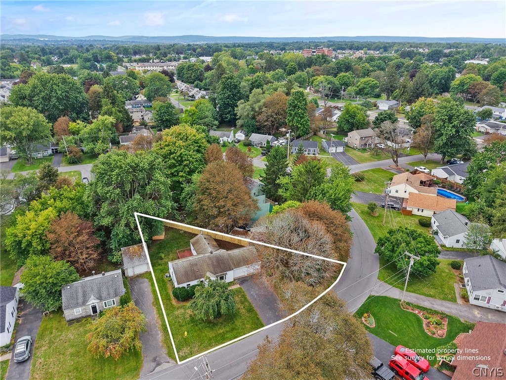 8 Homeland Road Clay, NY 13212 - Photo 23 of 26 The bird's-eye view shows the full plot of land as it is tucked into the peaceful corner of Homeland Rd.