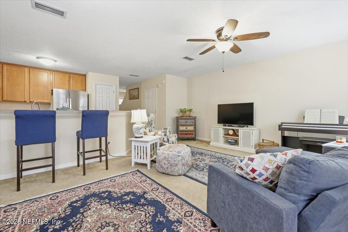 6700 Bowden Road, Unit 702 Jacksonville, FL 32216 - Photo 6 of 16 06-Living to Kitchen