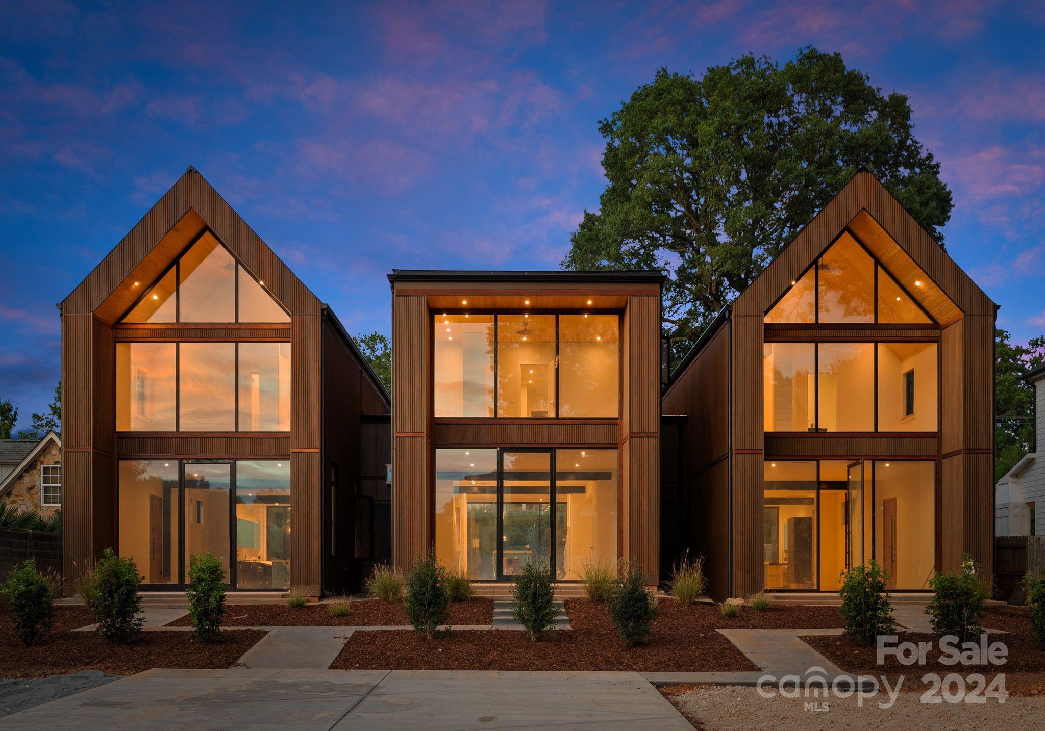 237 Marsh Road, Unit 101 Charlotte, NC 28209 - Photo 1 of 48 a front view of a house with a yard