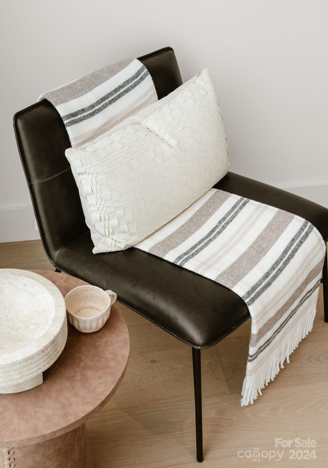 237 Marsh Road, Unit 101 Charlotte, NC 28209 - Photo 13 of 48 a close up of a chair