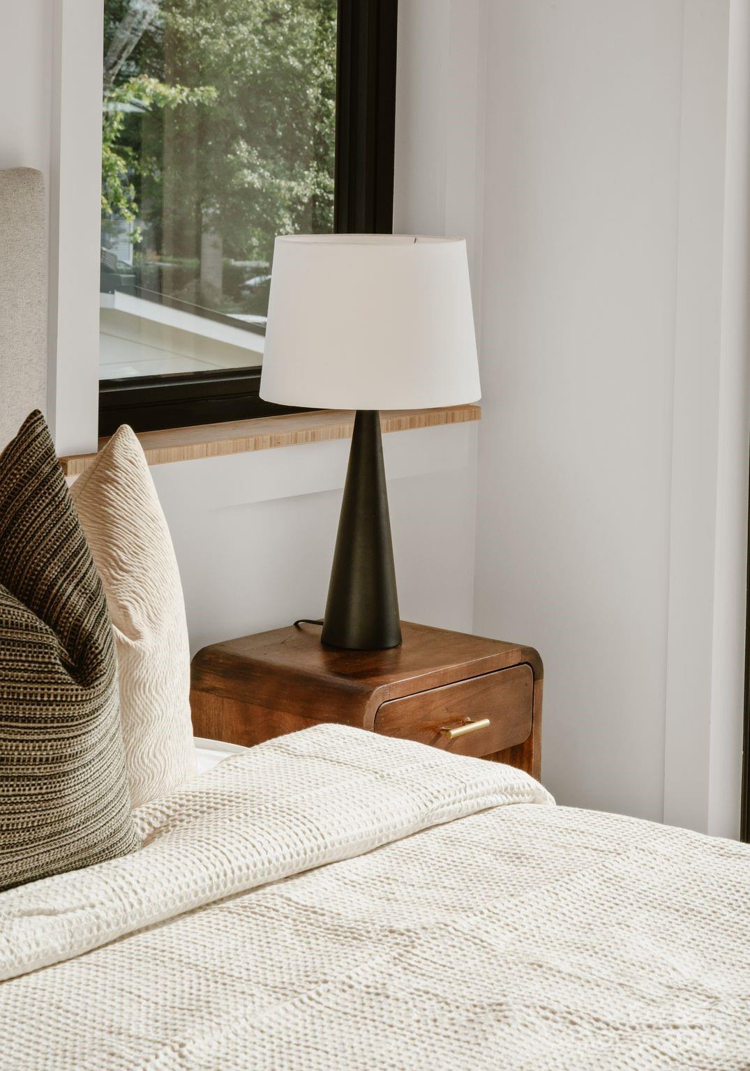 237 Marsh Road, Unit 101 Charlotte, NC 28209 - Photo 21 of 48 a bedroom with a bed and window