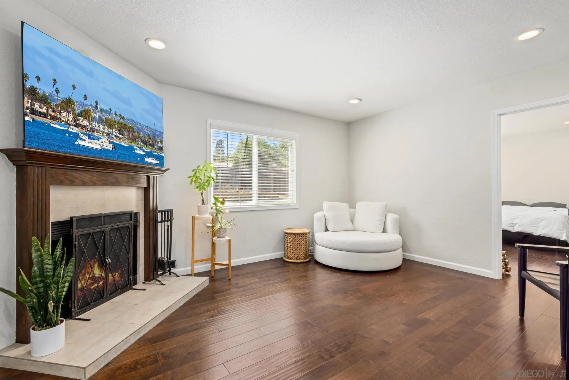 346 El Monte Road El Cajon, CA 92020 - Photo 11 of 24 a living room with furniture and a fireplace