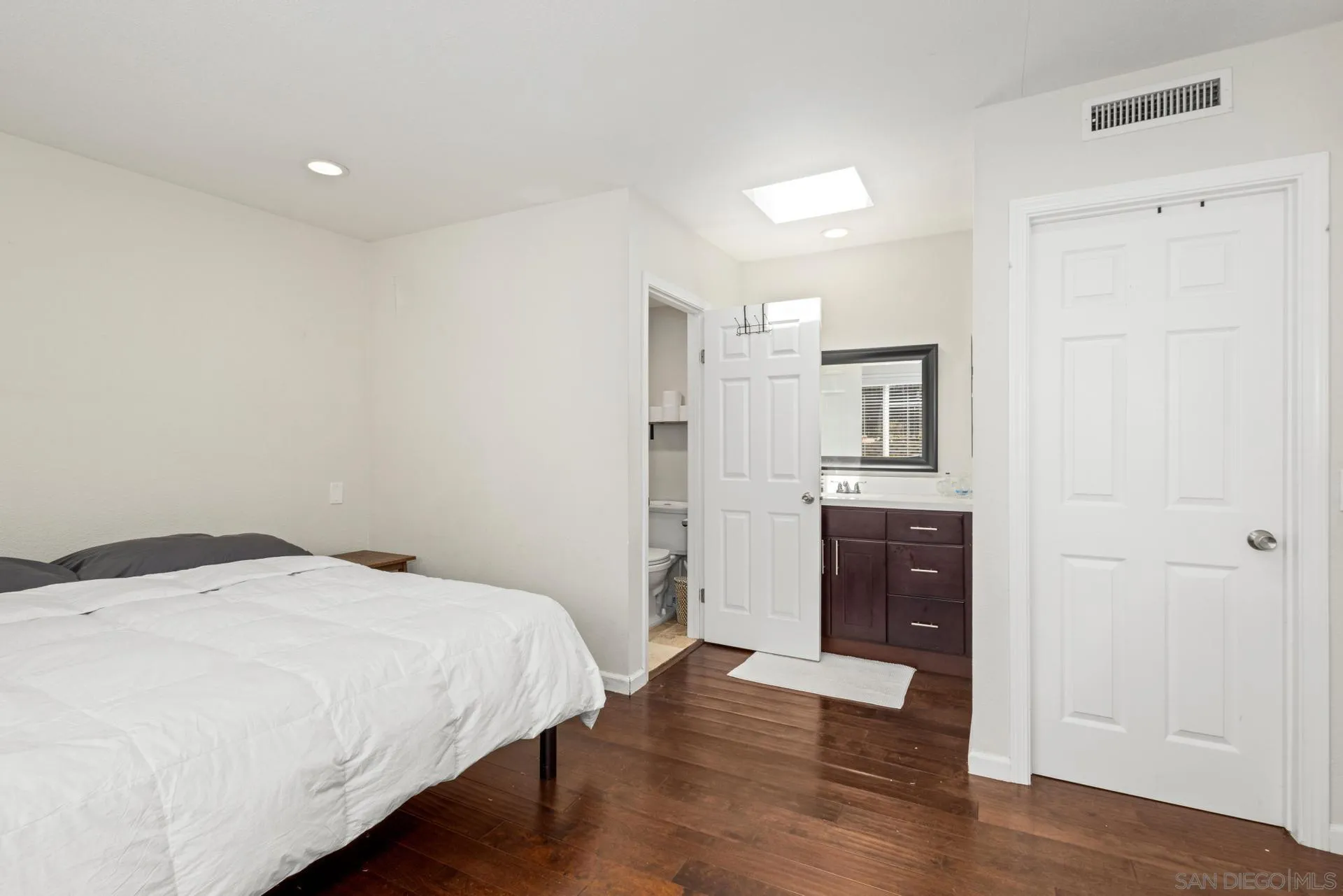 346 El Monte Road El Cajon, CA 92020 - Photo 15 of 24 a bedroom with a bed and a dresser