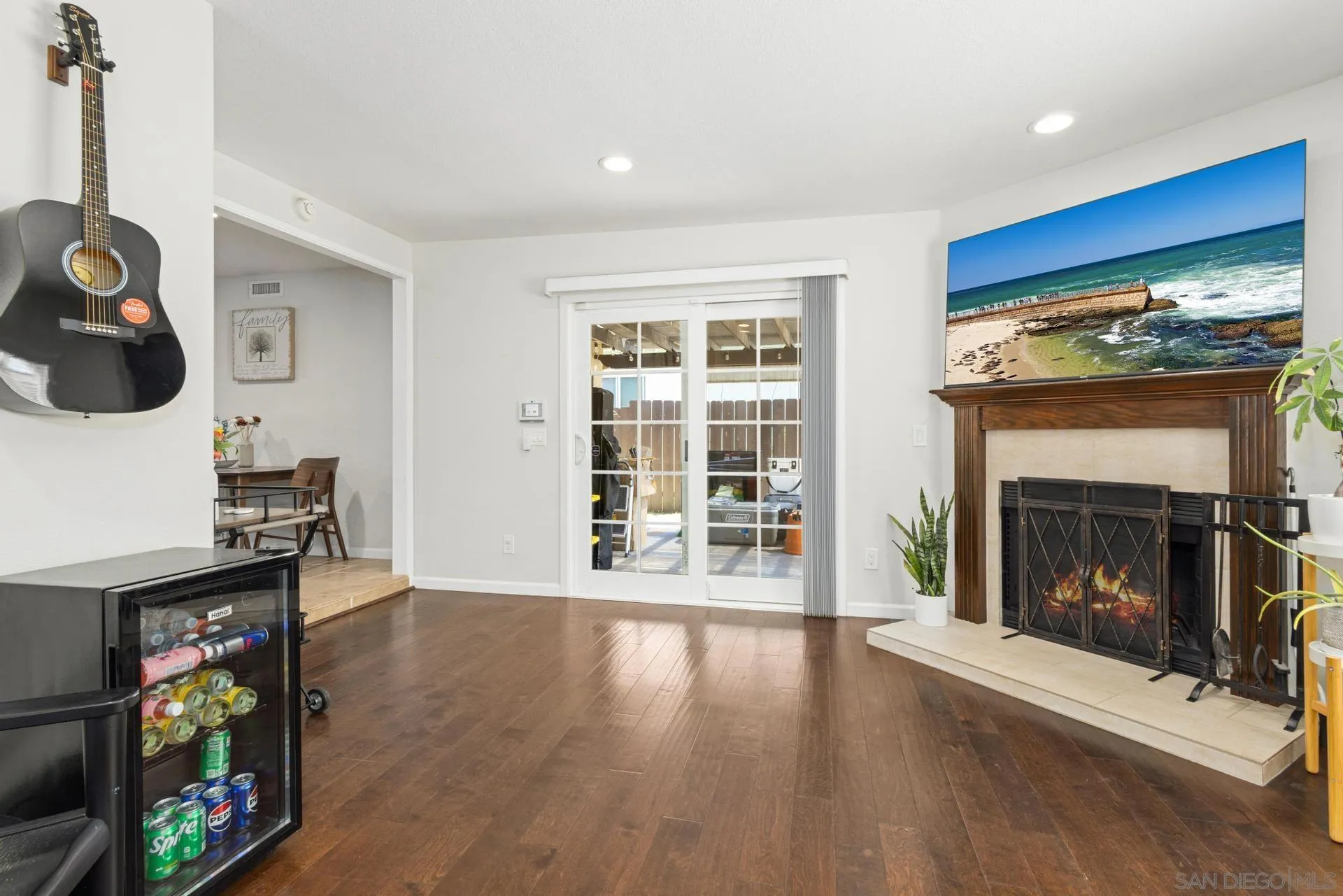 346 El Monte Road El Cajon, CA 92020 - Photo 9 of 24 a living room with furniture and a fireplace
