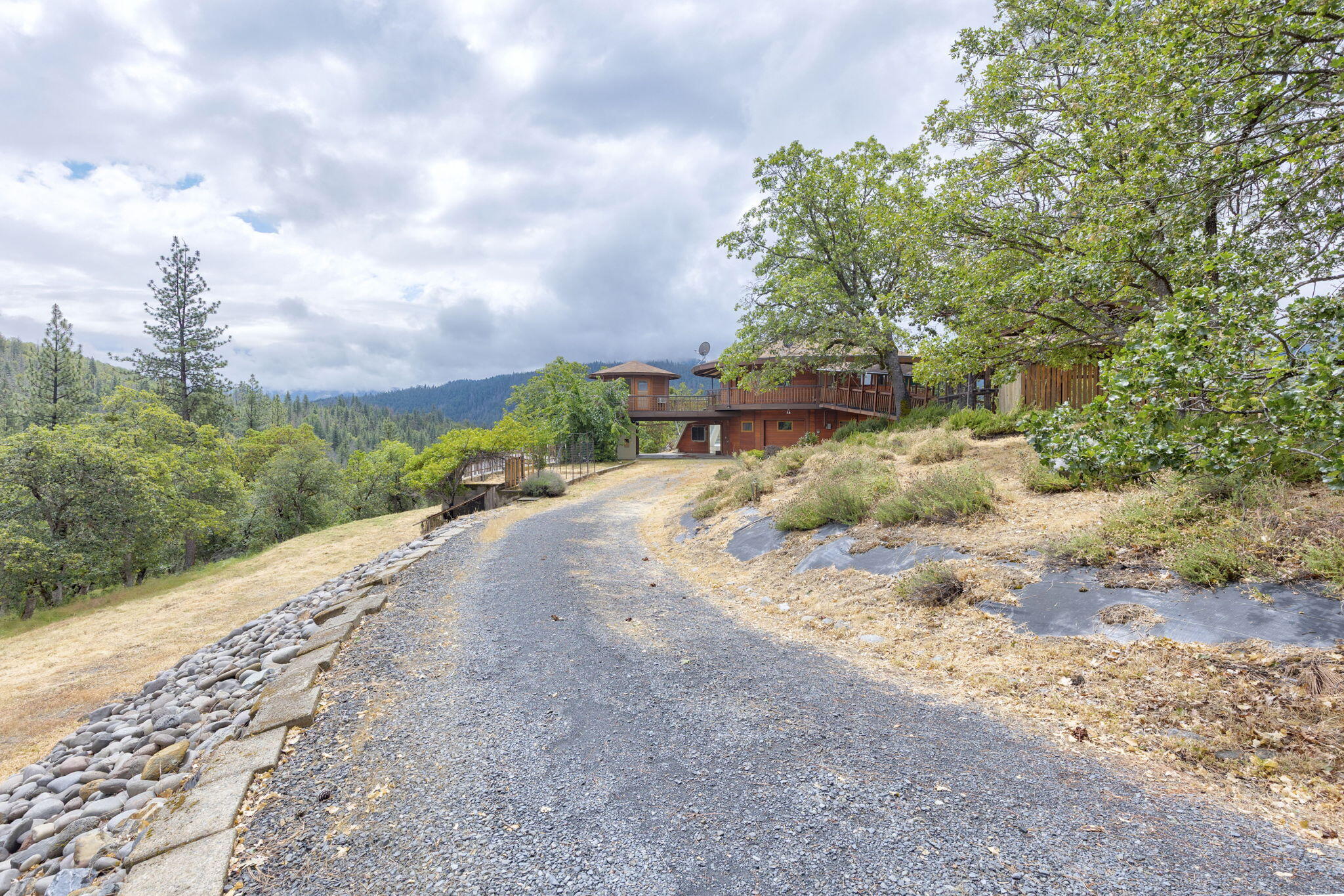 9595 Sterling Creek Road Jacksonville, OR 97530 - Photo 61 of 76 a view of a road with a yard