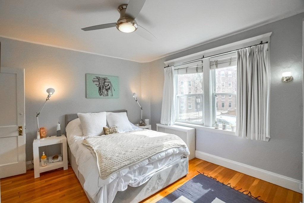 22 James Street, Unit 1 Brookline, MA 02446 - Photo 14 of 24 a bed room with a bed and a window