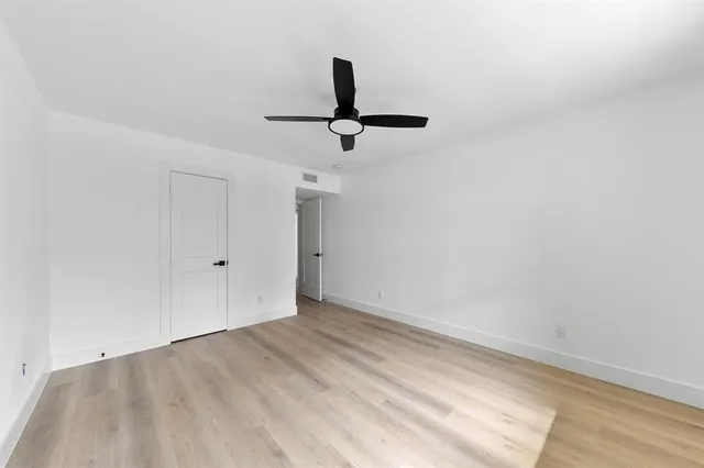 a view of a room with a sink and a window