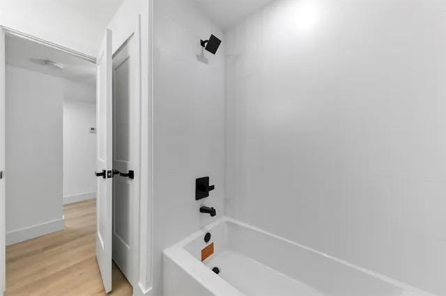 a bathroom with a bathtub