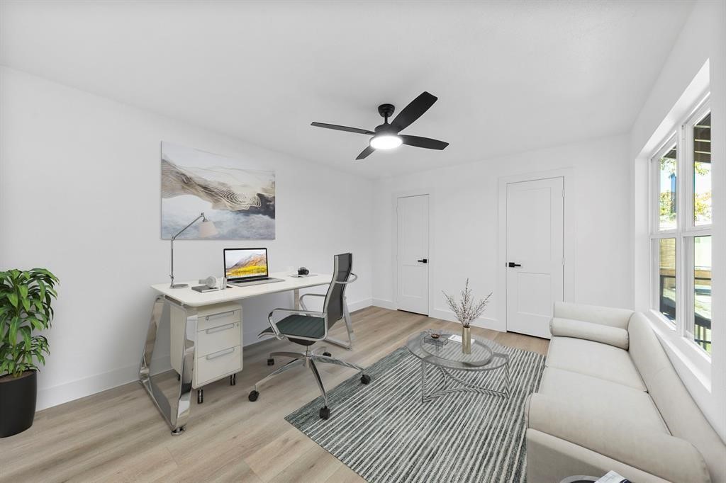 1514 Wirt Road, Unit 4 Houston, TX 77055 - Photo 2 of 20 a living room with furniture a window and a potted plant