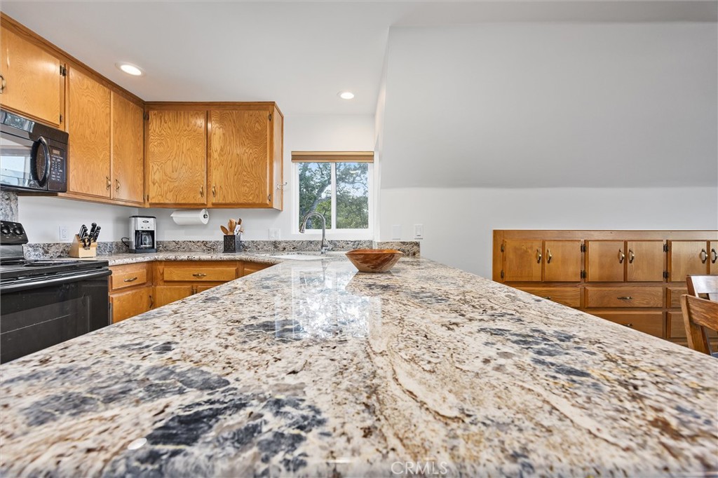 28207 Oaks Rancho Road Keene, CA 93531 - Photo 16 of 48 a view of kitchen with sink and cabinets