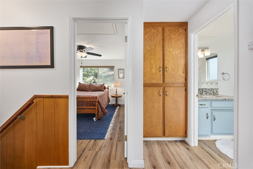 28207 Oaks Rancho Road Keene, CA 93531 - Photo 21 of 48 a en suite bathroom with a granite countertop sink and a mirror