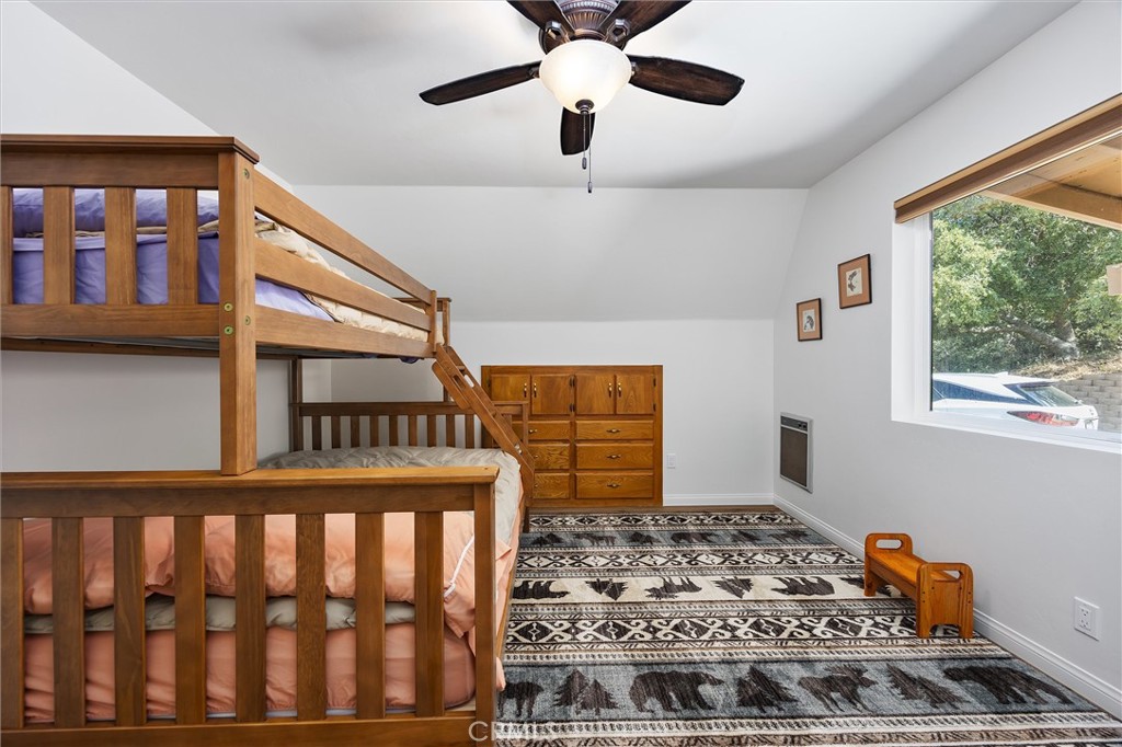 28207 Oaks Rancho Road Keene, CA 93531 - Photo 27 of 48 a bedroom with furniture and window