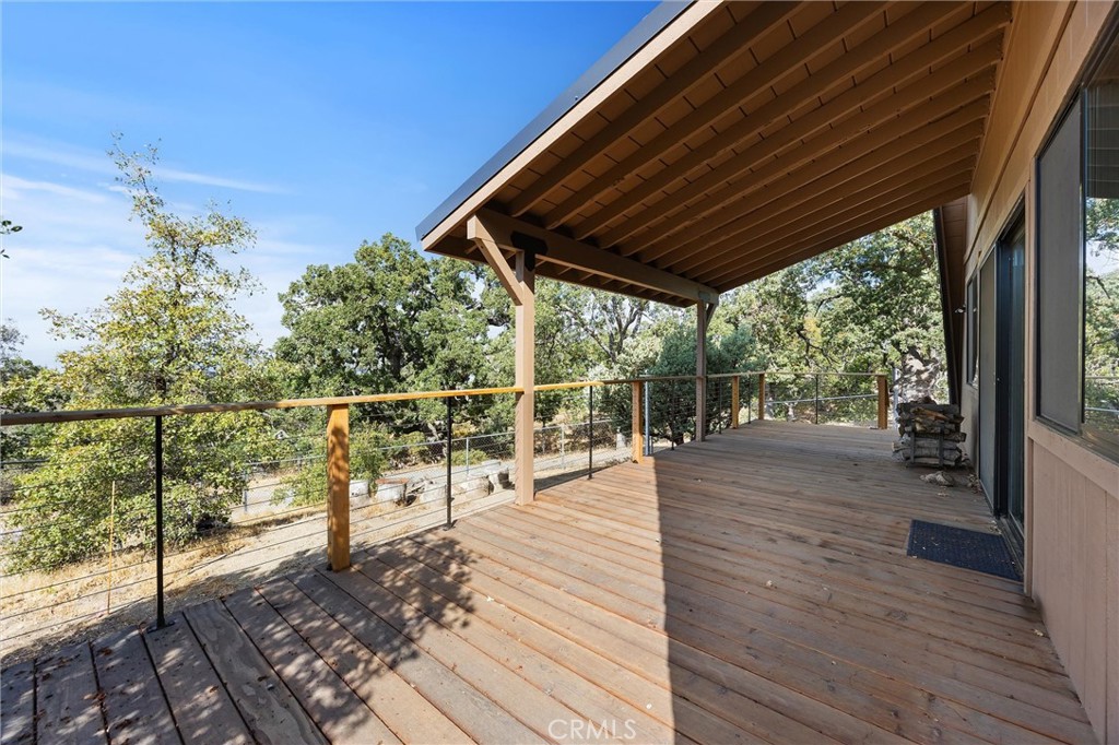 28207 Oaks Rancho Road Keene, CA 93531 - Photo 34 of 48 a view of a balcony with wooden floor