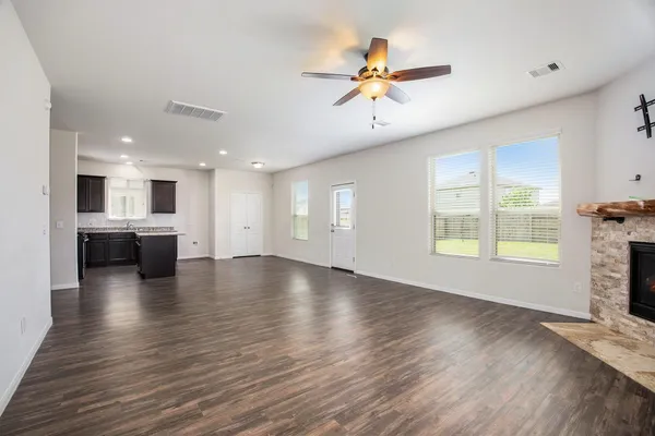 a view of a kitchen with a dishwasher cabinets and a kitchen