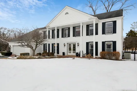 a view of a building with a snow in front of it