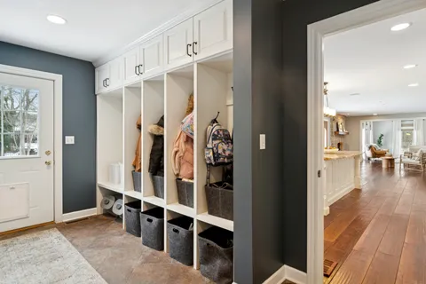 a view of a livingroom with furniture and hardwood floor