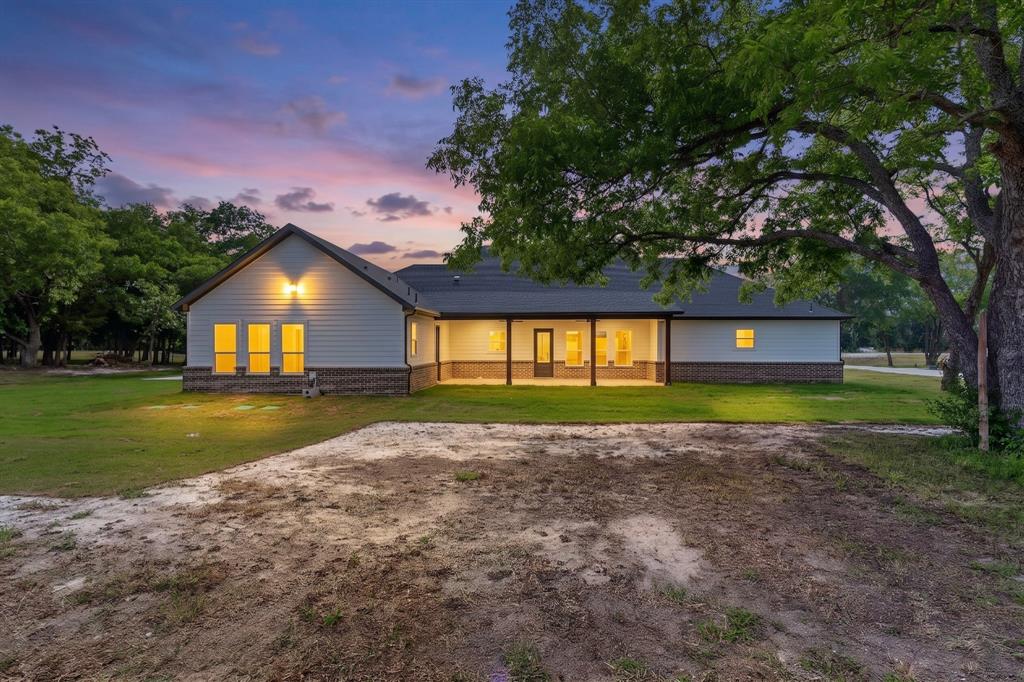 9080 County Road 669 Blue Ridge, TX 75424 - Photo 2 of 40 a view of a house with a yard